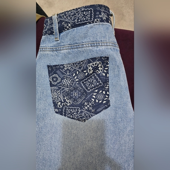 Edikted Light Blue Flare Jeans with Dark Patterned Pockets - Picture 4 of 6